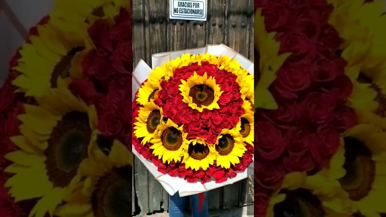 Ramo de rosas con girasol